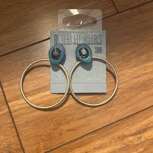 Beautiful Robert Lee Morris gold Hoops with stone Accent.